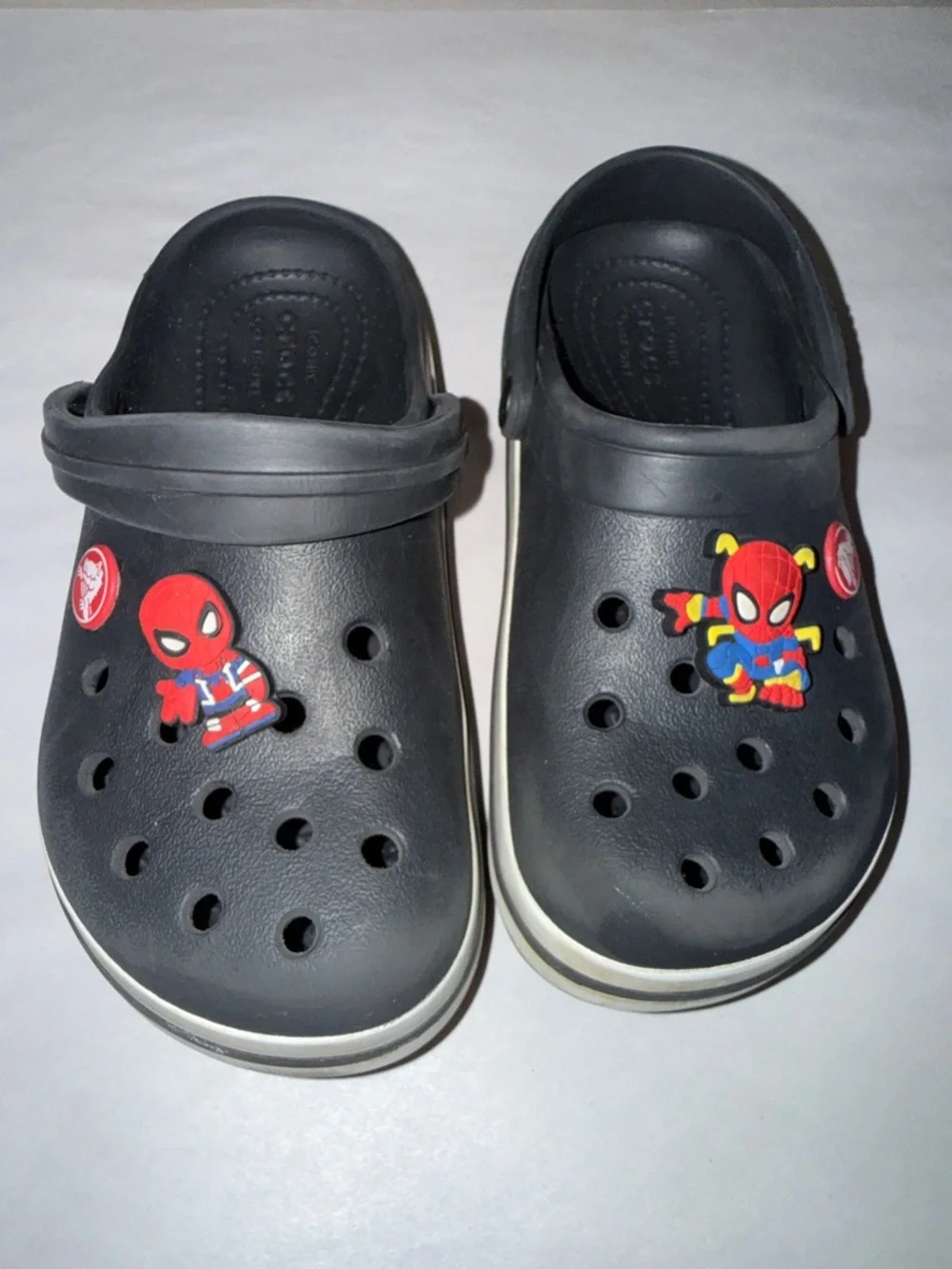 Crocs black youth size 12 with Spider-Man croc charms jibbits